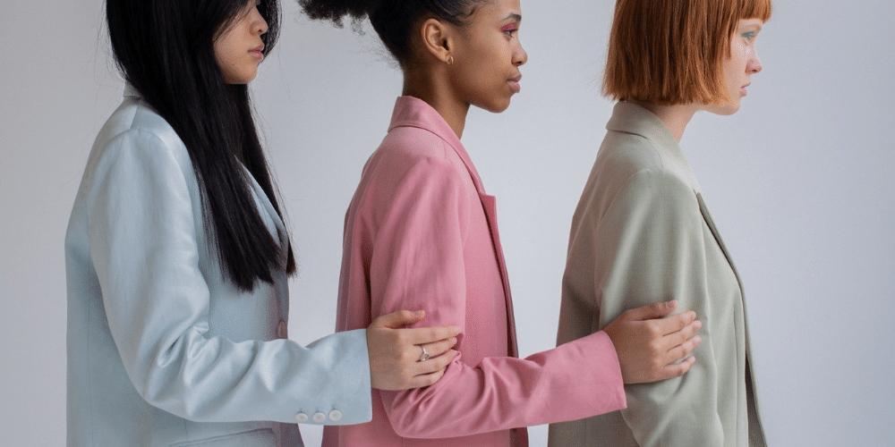 Fashionable women stand in line